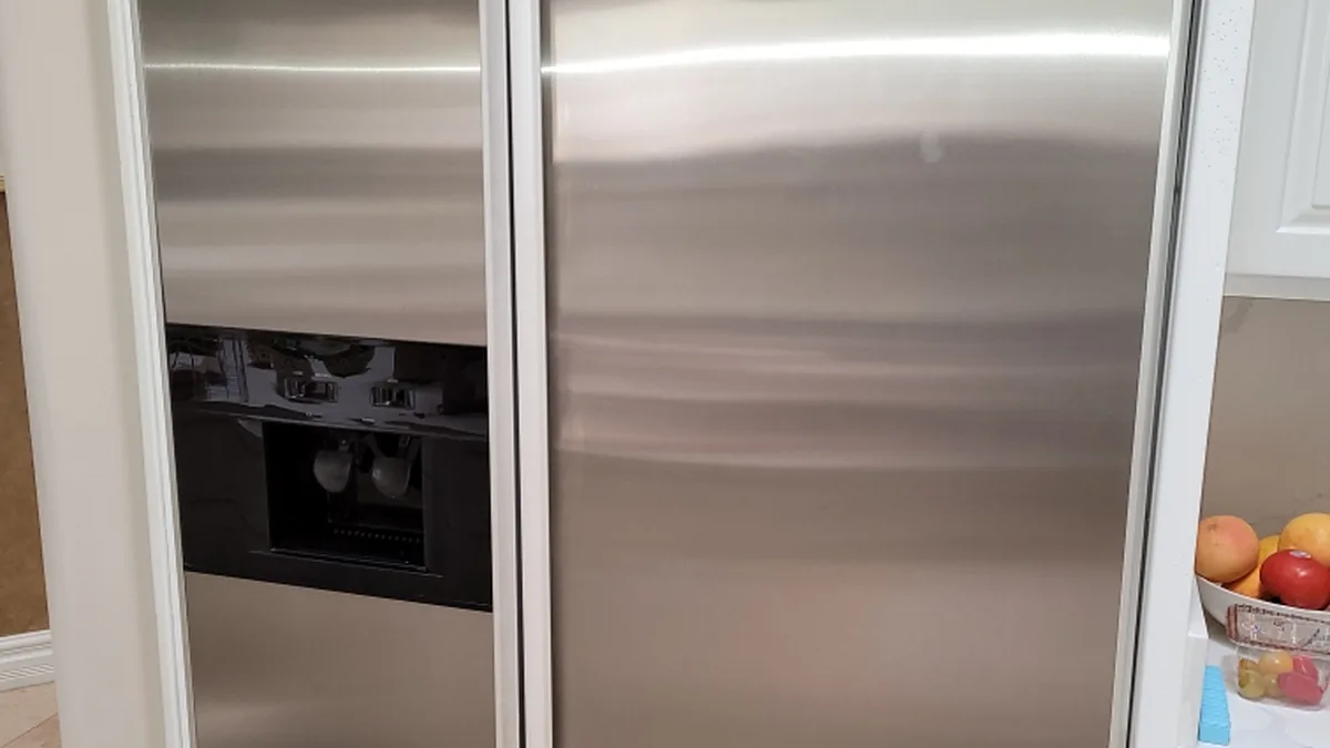 Factory-certified appliance repair technician servicing luxury refrigeration, laundry suites, and cooking ranges in Flossmoor, IL